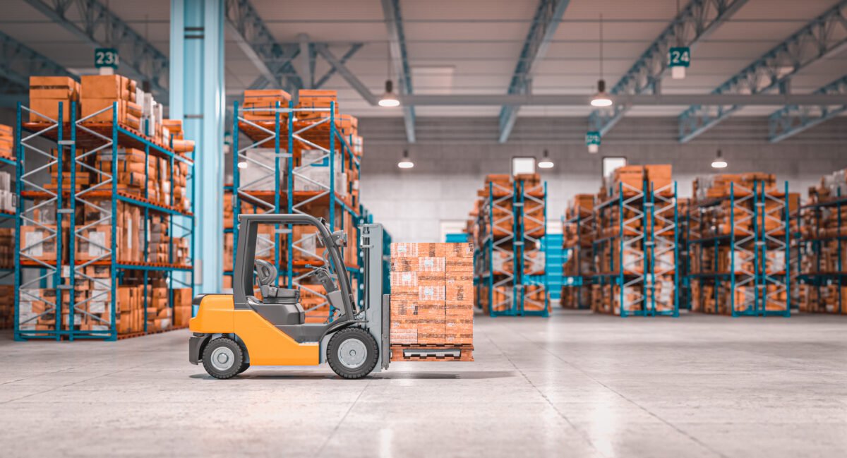 Forklift moving pallets in a large warehouse